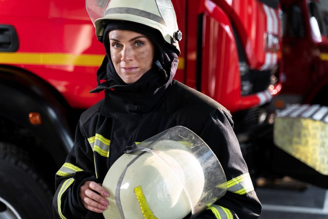 female-firefighter-station-with-suit-safety-helmet